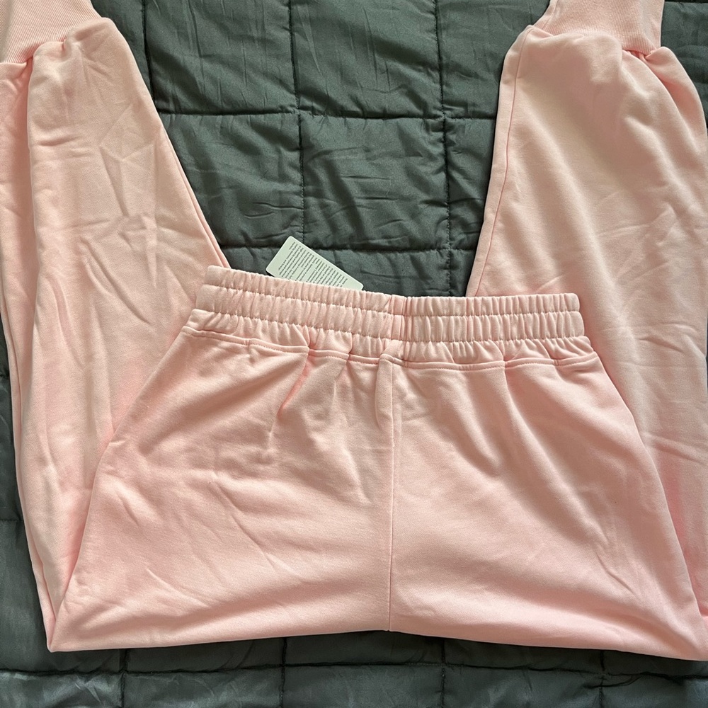 pink yoga style sweatpants.